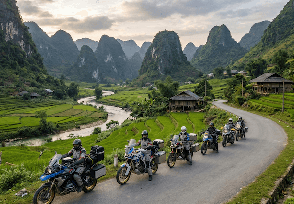 Riders lined up on a road above the rice terraces of northern Vietnam