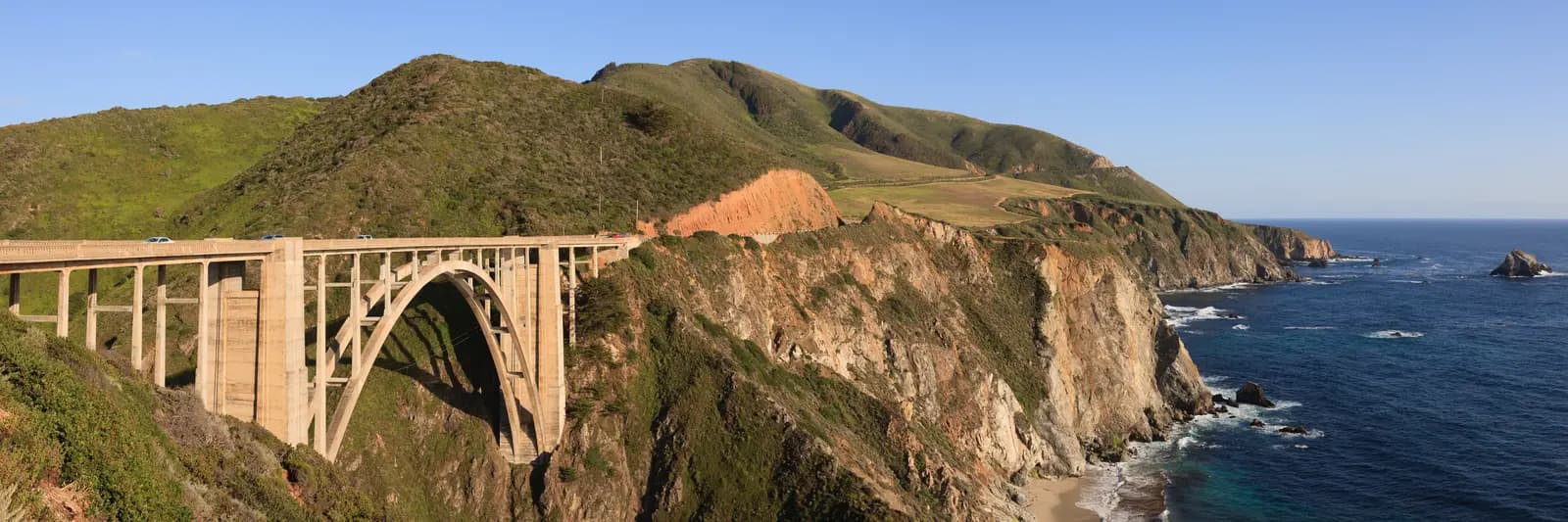 Bixby Creek Bridge spanning its canyon, with the Big Sur coast and the Pacific beyond