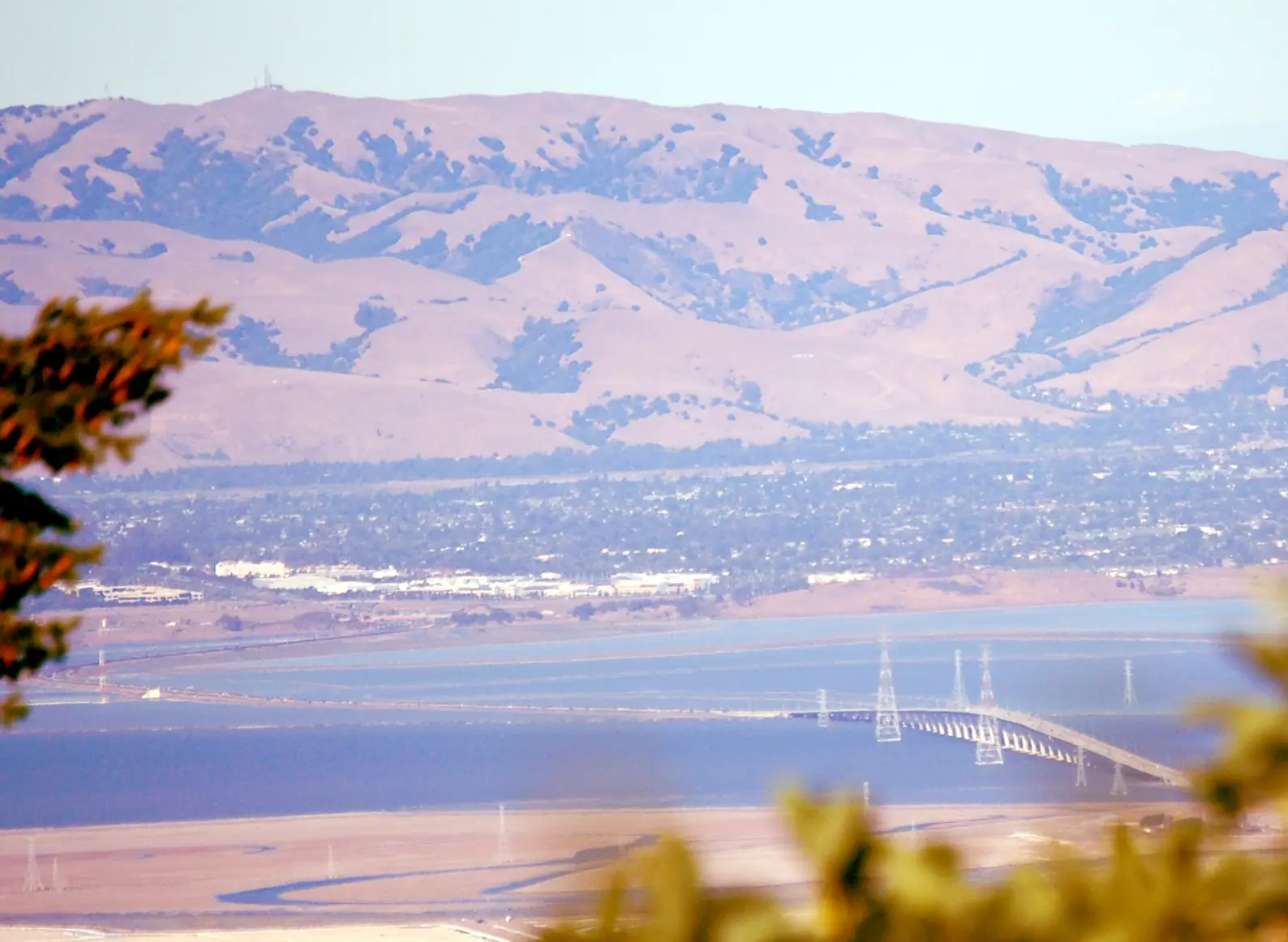 The Dumbarton Bridge crossing the southern bay below the East Bay hills, seen from Skeggs Point