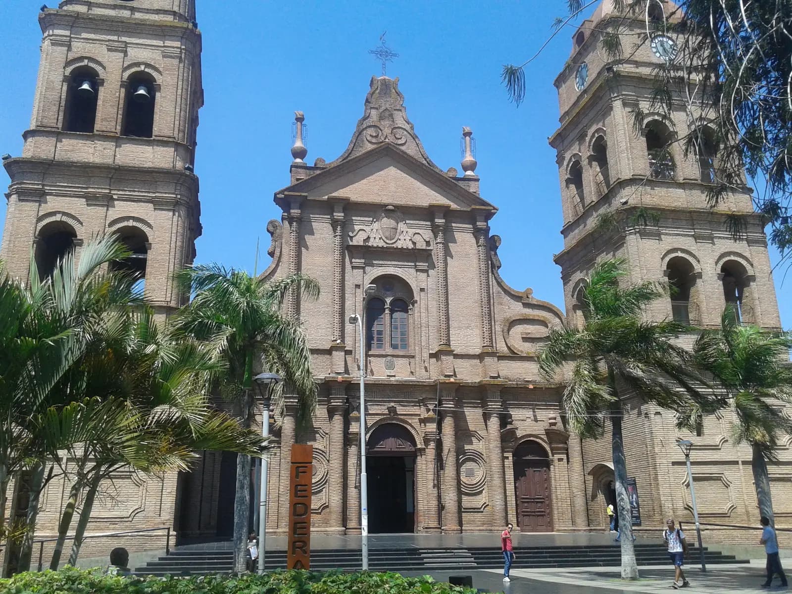 Brick facade and twin bell towers of the cathedral on Plaza 24 de Septiembre in Santa Cruz